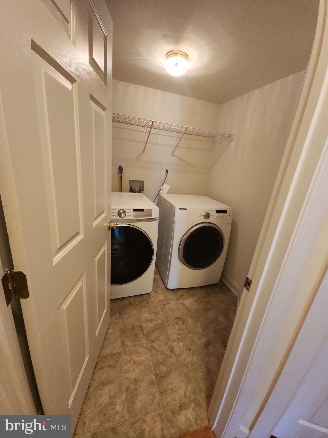 6681 Debra Lu Way Springfield, VA 22150 - Photo 28 of 57 a utility room with dryer and washer