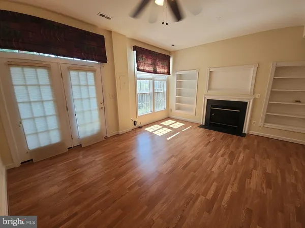 a view of a hallway with workspace