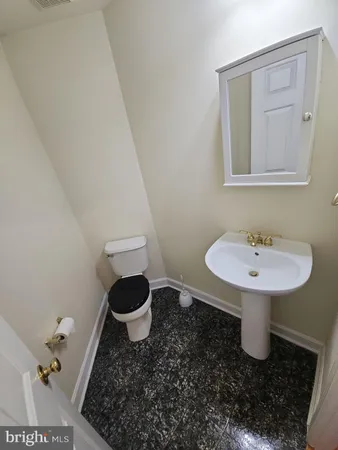 a bathroom with a sink and a toilet
