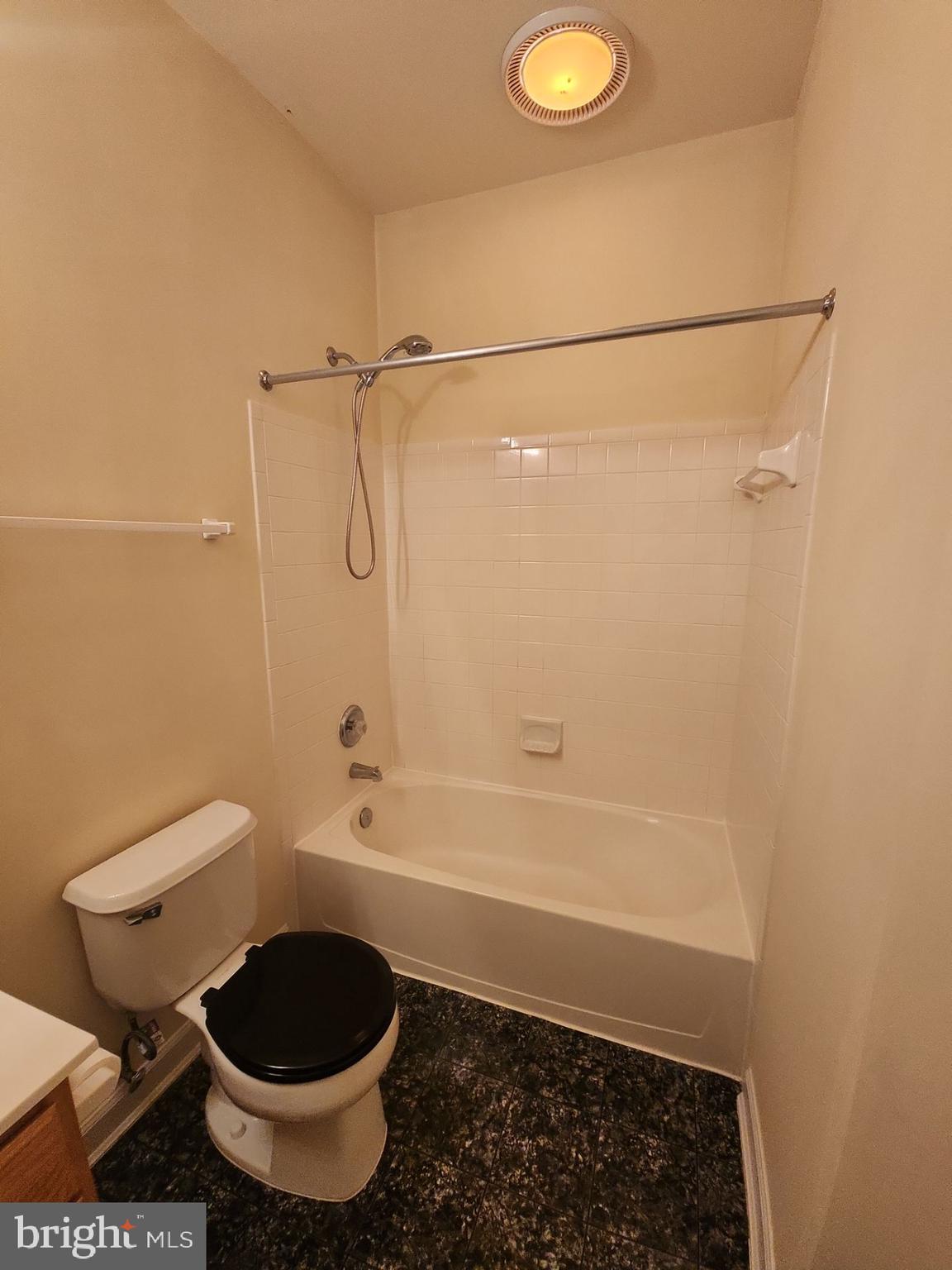 6681 Debra Lu Way Springfield, VA 22150 - Photo 51 of 57 a bathroom with a toilet and a shower