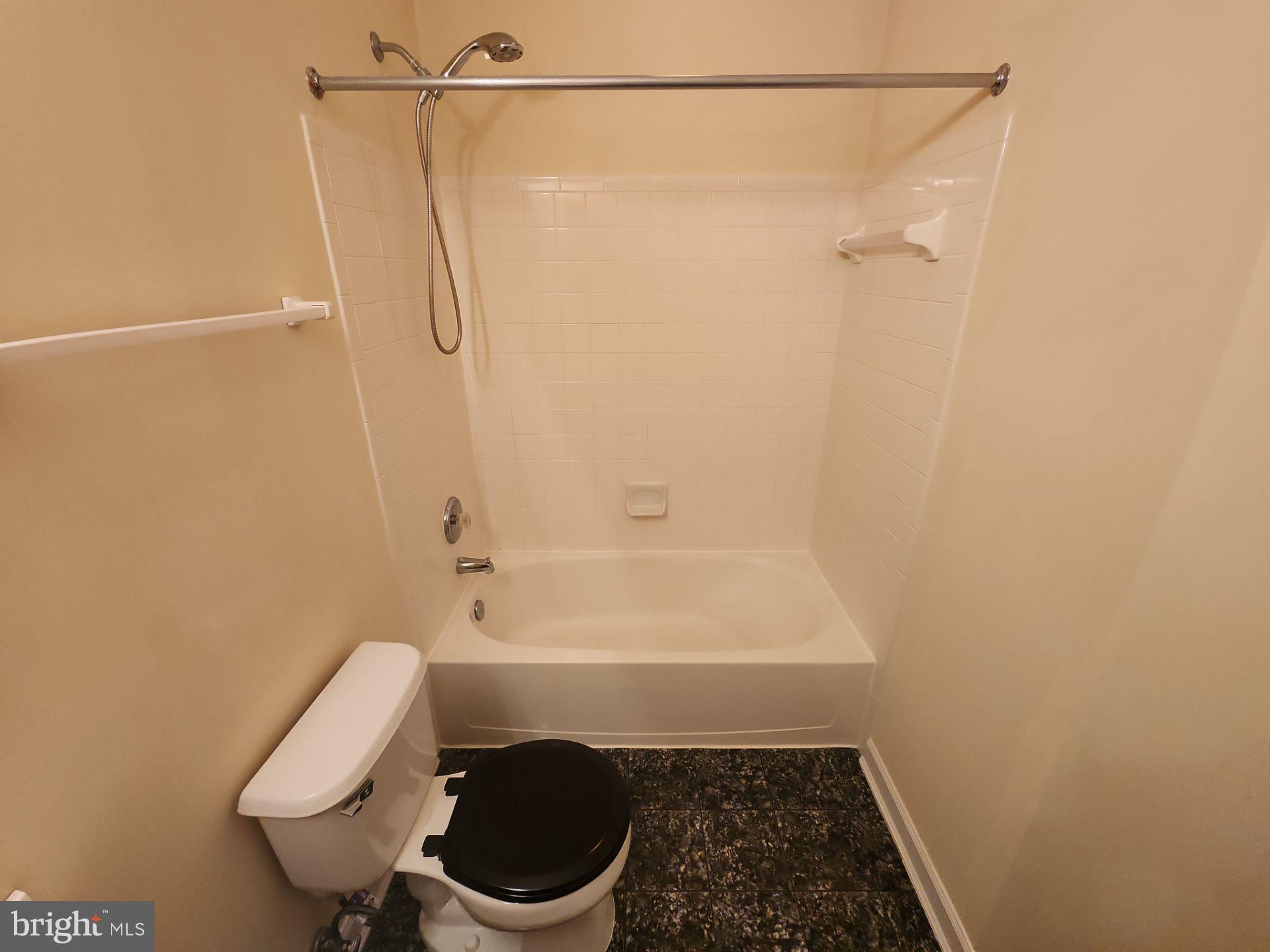 6681 Debra Lu Way Springfield, VA 22150 - Photo 53 of 57 a bathroom with a shower and toilet