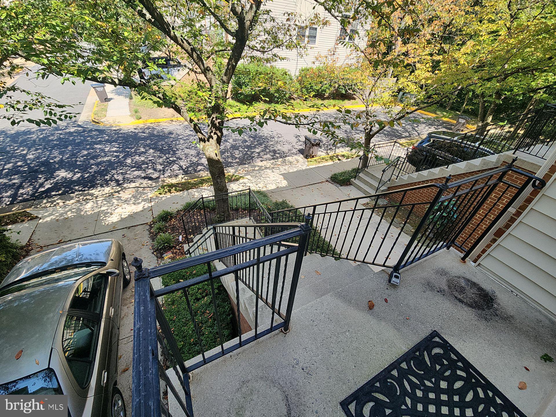 6681 Debra Lu Way Springfield, VA 22150 - Photo 57 of 57 a view of balcony with wooden floor and fence