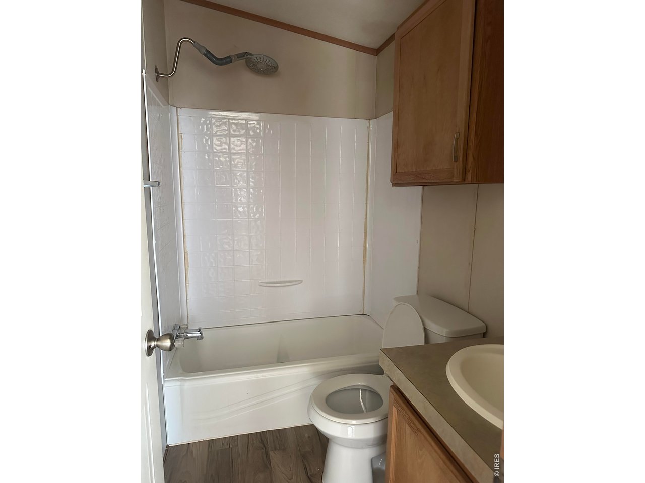 17190 Mt Vernon Road, Unit 3 Golden, CO 80401 - Photo 10 of 10 a bathroom with a sink a toilet and shower
