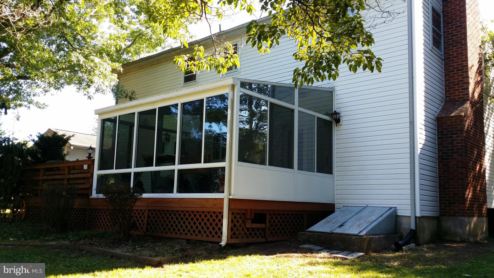 2448 Appleton Road Elkton, MD 21921 - Photo 3 of 29 a view of a house with a large window and wooden fence