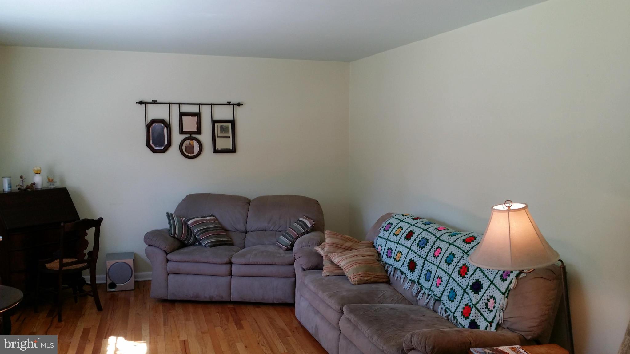 2448 Appleton Road Elkton, MD 21921 - Photo 9 of 29 a living room with furniture and wooden floor