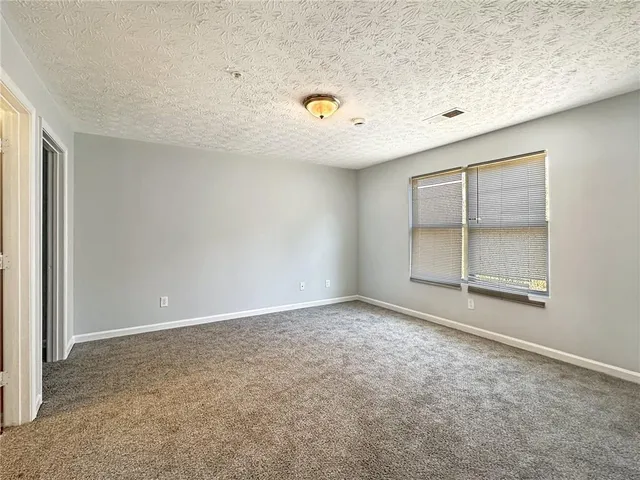 an empty room with a natural light