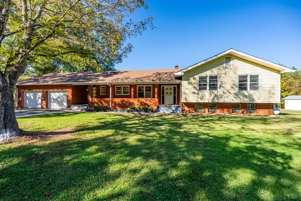 a view of a house with a big yard