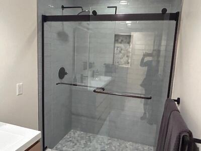 1420 Ocean Way Drive, Unit 32C Jupiter, FL 33477 - Photo 16 of 25 a bathroom with a shower