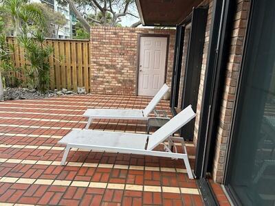 1420 Ocean Way Drive, Unit 32C Jupiter, FL 33477 - Photo 3 of 25 a view of entryway with a front door