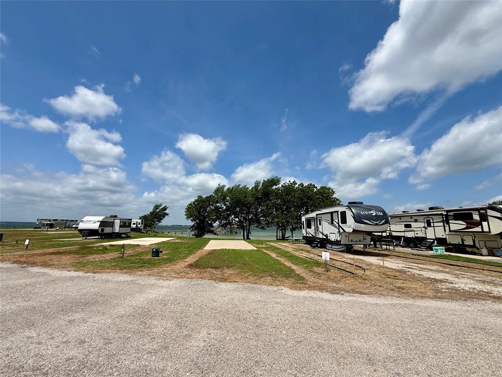5136 Peninsula Road Kerens, TX 75144 - Photo 34 of 40 Asphalt road frontage beside the improved RV site.