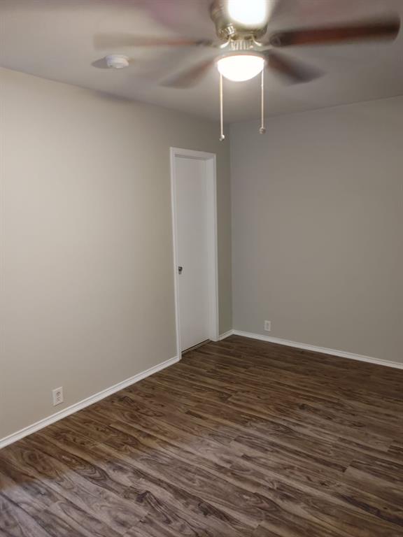 2645 Ezekial Way Plano, TX 75074 - Photo 11 of 16 a view of an empty room with wooden floor