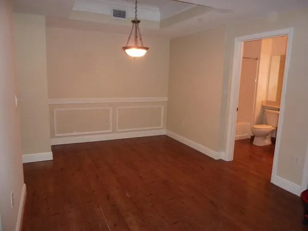 an empty room with a bathroom