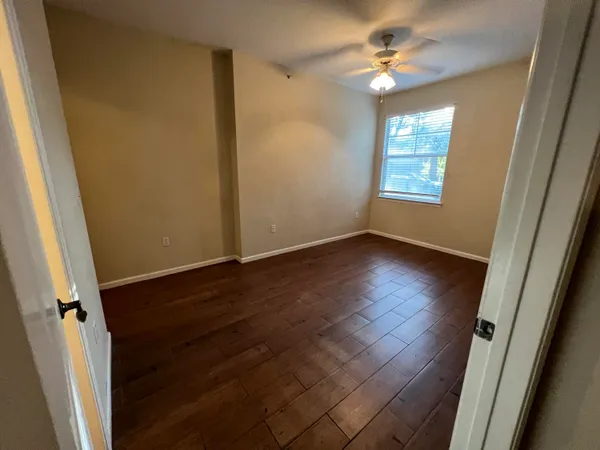 a bathroom with a shower toilet and sink