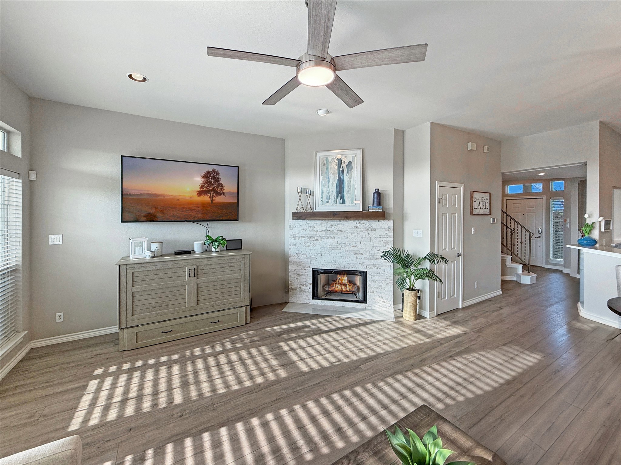 2918 Ranch Road 620 North, Unit Y199 Austin, TX 78734 - Photo 14 of 39 a living room with a couch and a flat screen tv