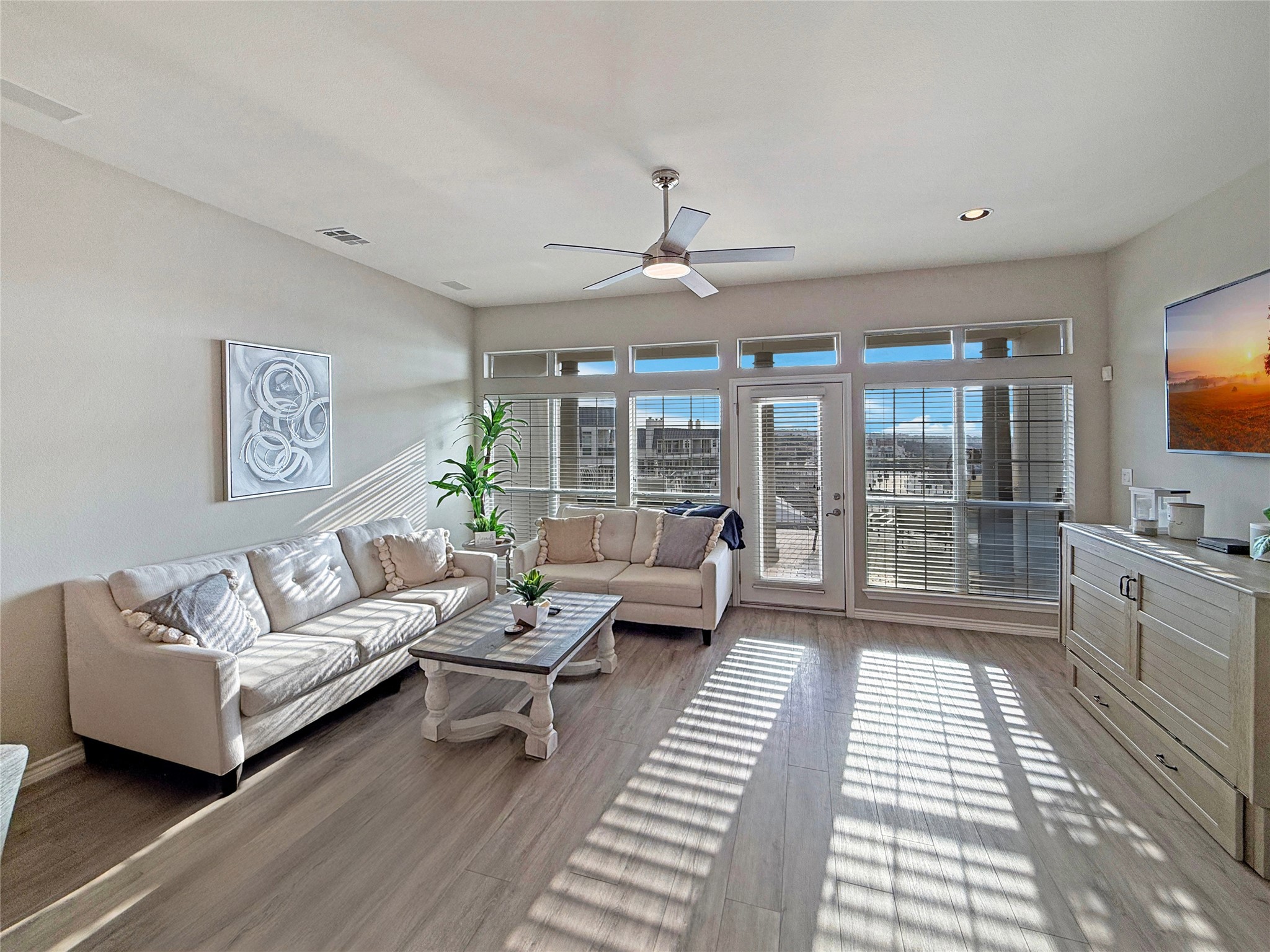 2918 Ranch Road 620 North, Unit Y199 Austin, TX 78734 - Photo 15 of 39 a living room with furniture and a flat screen tv