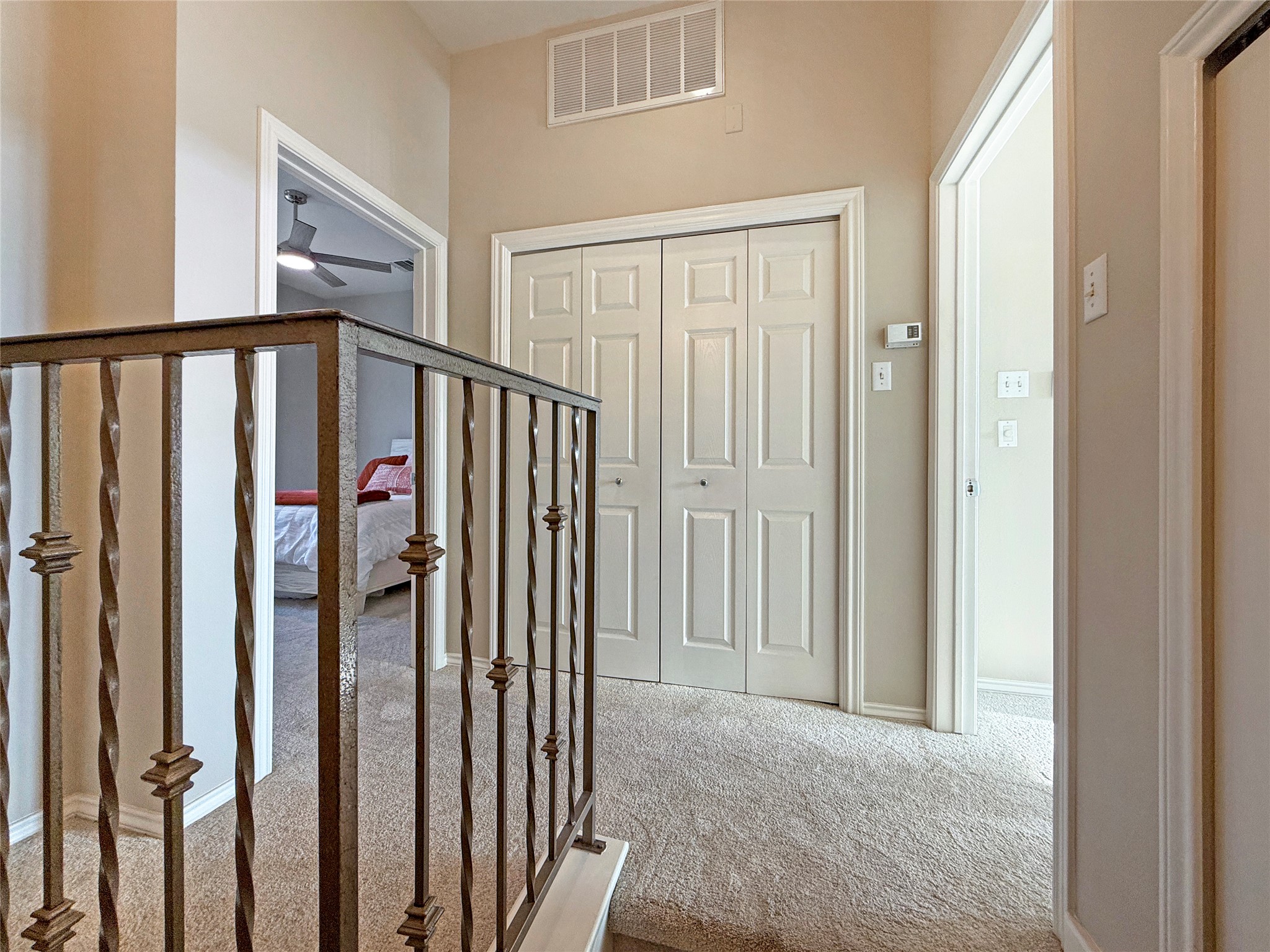 2918 Ranch Road 620 North, Unit Y199 Austin, TX 78734 - Photo 19 of 39 a view of a hallway with wooden floor and staircase