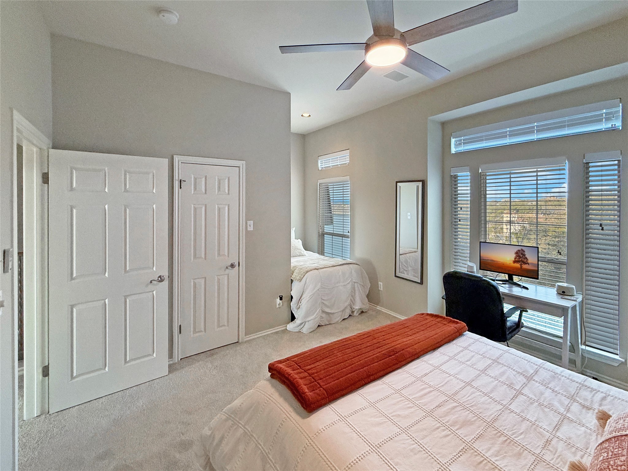 2918 Ranch Road 620 North, Unit Y199 Austin, TX 78734 - Photo 28 of 39 a bedroom with a bed lamp and a dresser
