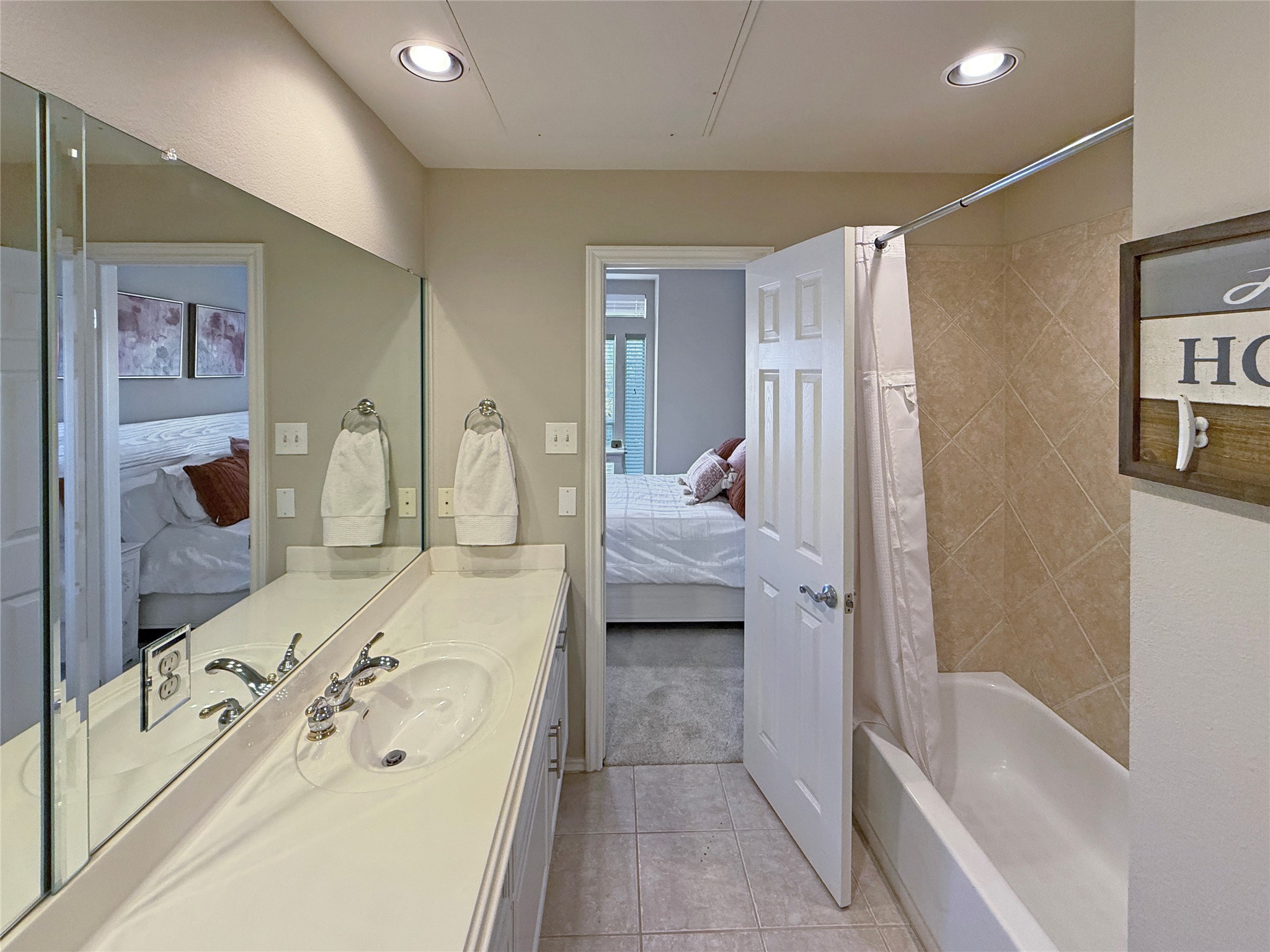2918 Ranch Road 620 North, Unit Y199 Austin, TX 78734 - Photo 30 of 39 a en suite spacious bathroom with a tub shower and mirror