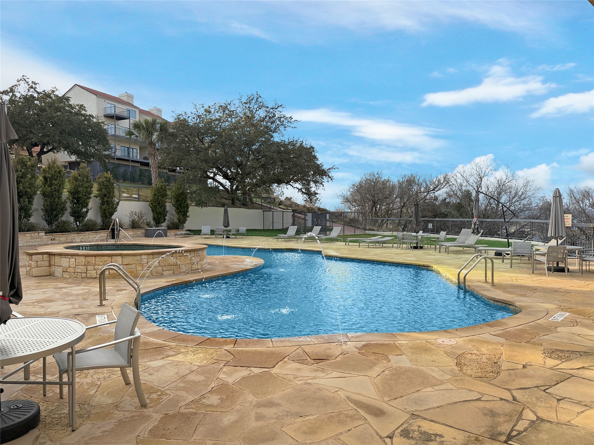 2918 Ranch Road 620 North, Unit Y199 Austin, TX 78734 - Photo 35 of 39 a view of a swimming pool with a patio