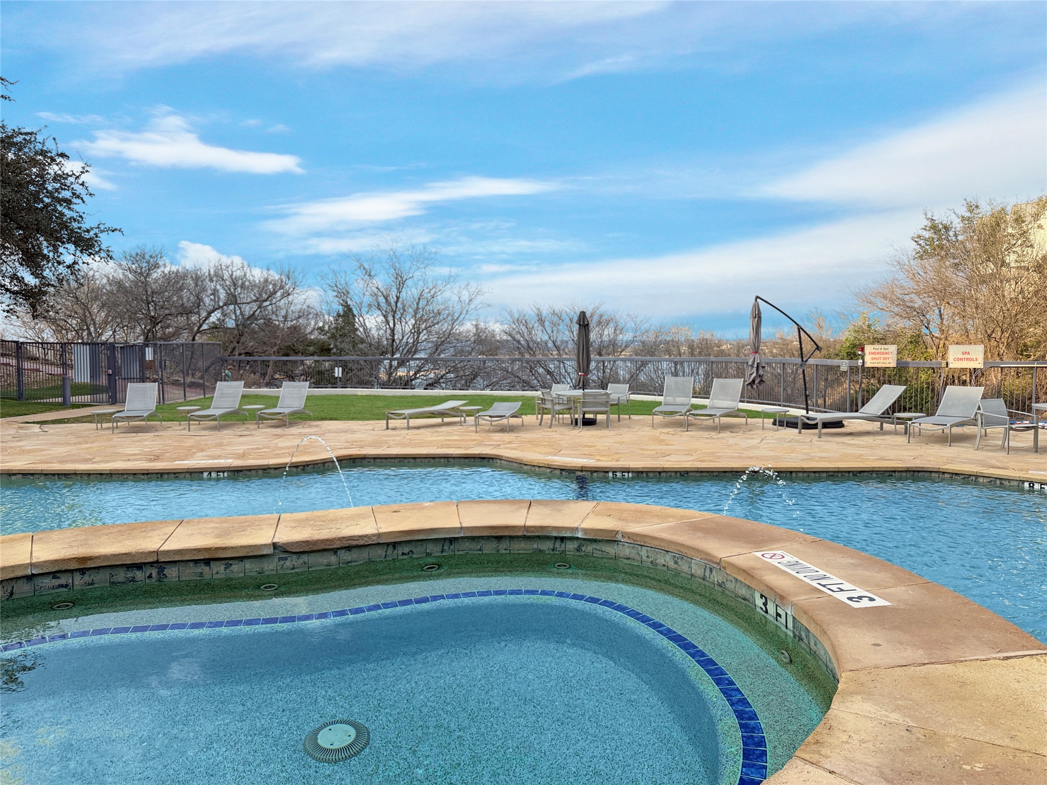 2918 Ranch Road 620 North, Unit Y199 Austin, TX 78734 - Photo 36 of 39 a view of swimming pool with outdoor seating and ocean view