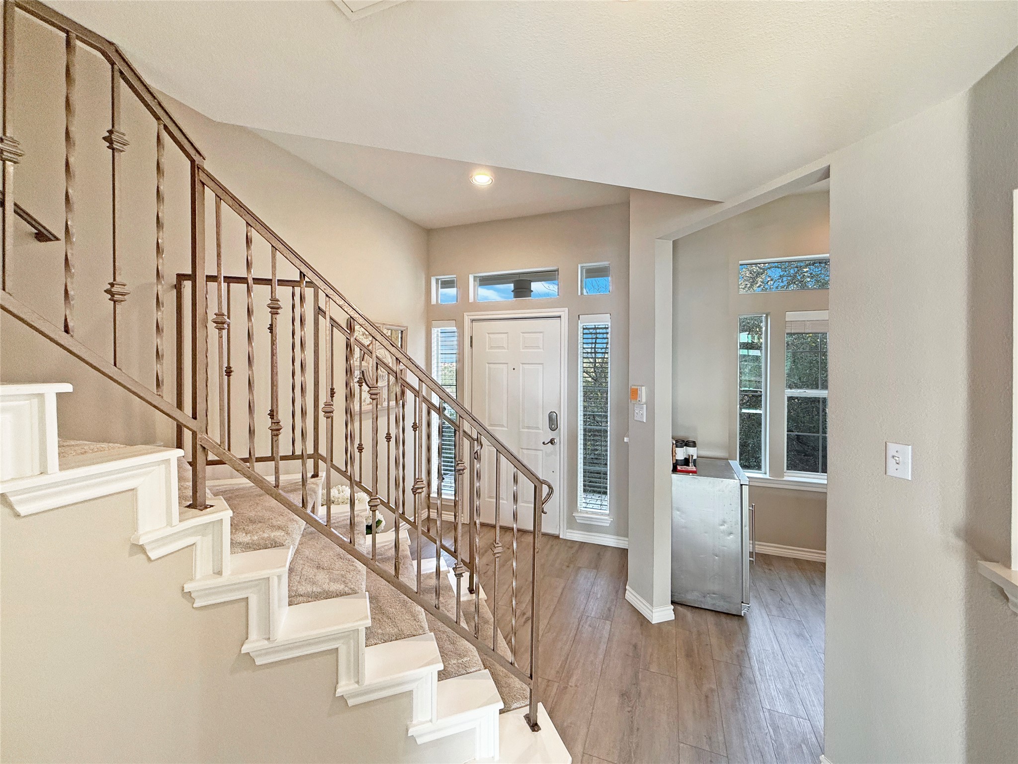 2918 Ranch Road 620 North, Unit Y199 Austin, TX 78734 - Photo 5 of 39 a view of entryway and hall with wooden floor