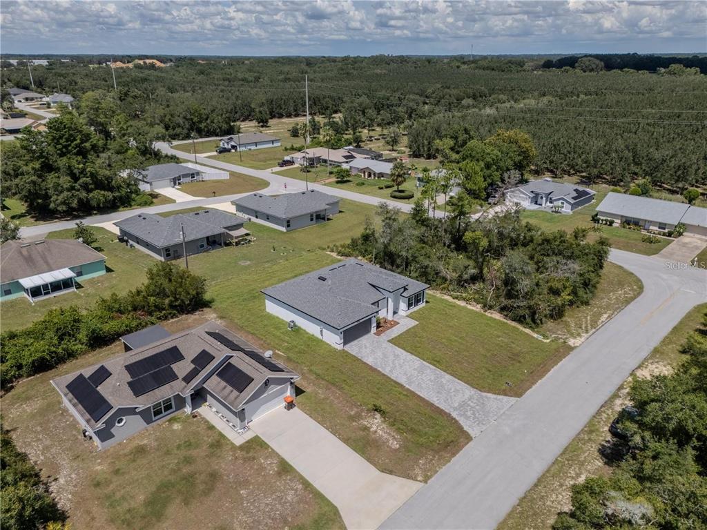 14245 Southwest 28th Court Ocala, FL 34473 - Photo 18 of 84 an aerial view of a house with a yard