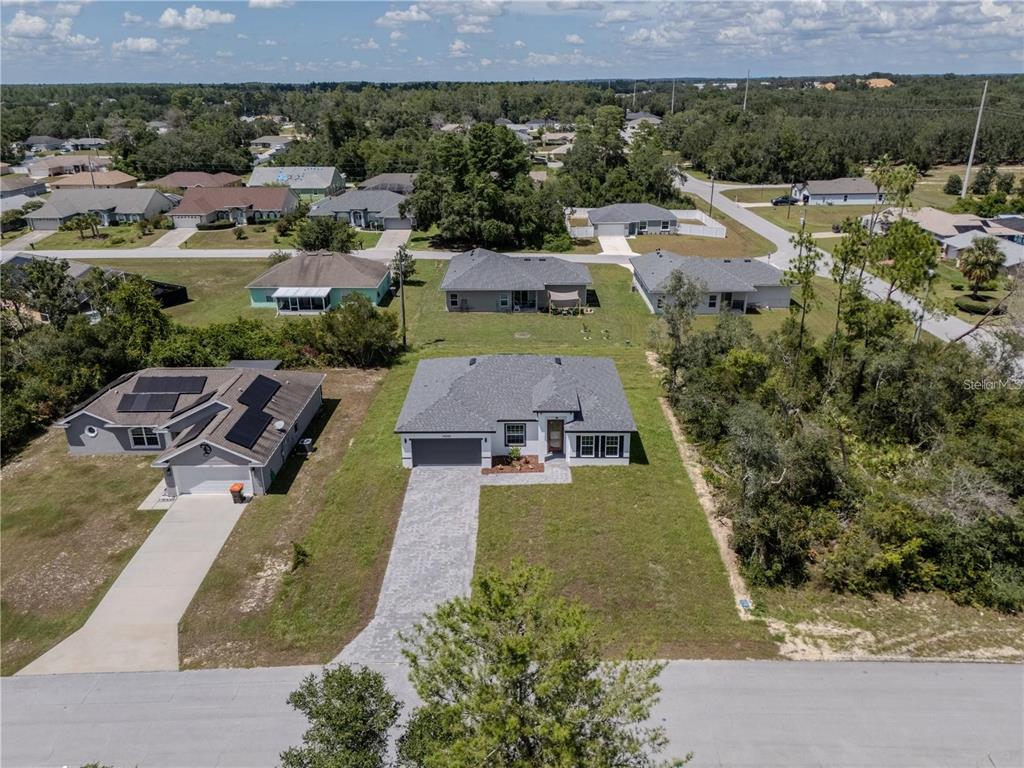 14245 Southwest 28th Court Ocala, FL 34473 - Photo 10 of 84 an aerial view of a house with a yard