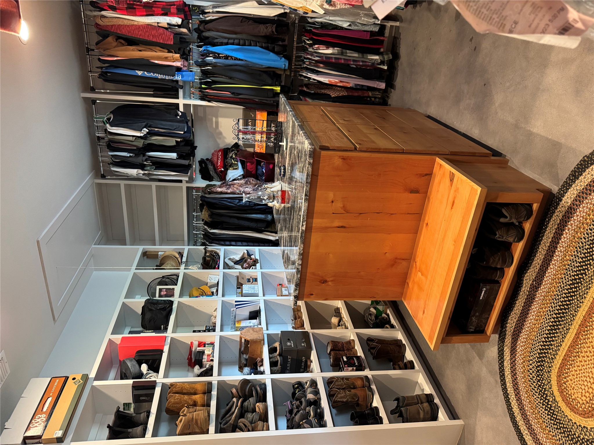 3724 Ranch Road 3347 Round Mountain, TX 78663 - Photo 13 of 40 a view of walk in closet with clothes and shoes