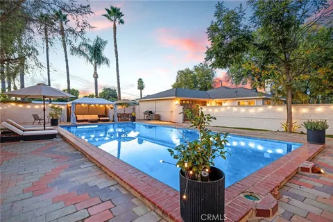 a view of a balcony with chairs