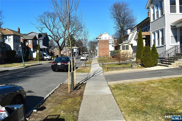 a view of a street with houses