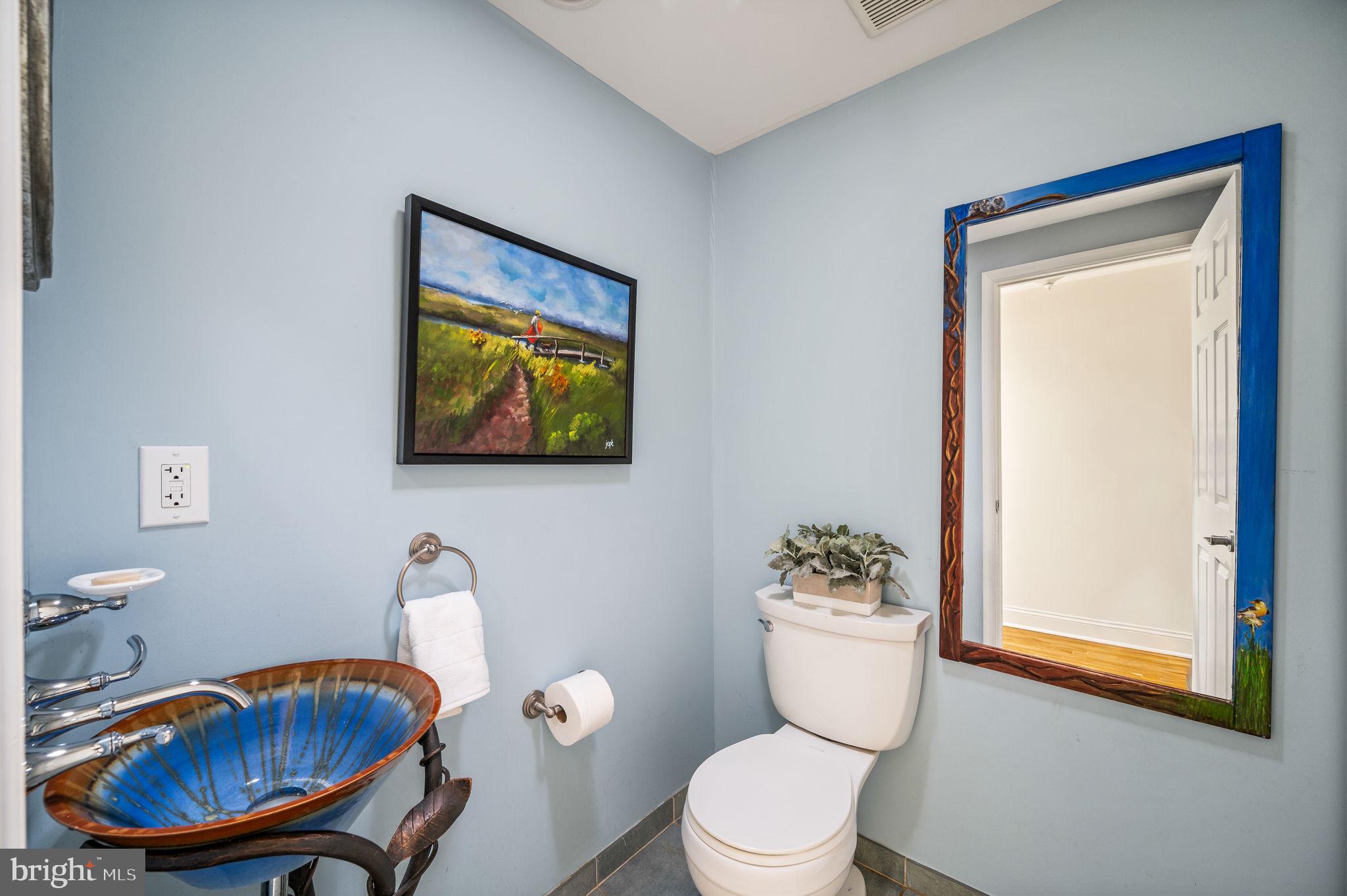 320 Riverview Road Swarthmore, PA 19081 - Photo 17 of 38 a bathroom with a toilet a sink and a mirror