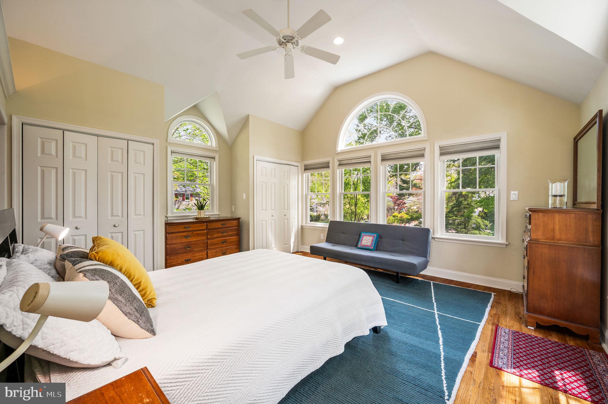 320 Riverview Road Swarthmore, PA 19081 - Photo 18 of 38 a bedroom with a bed and large windows