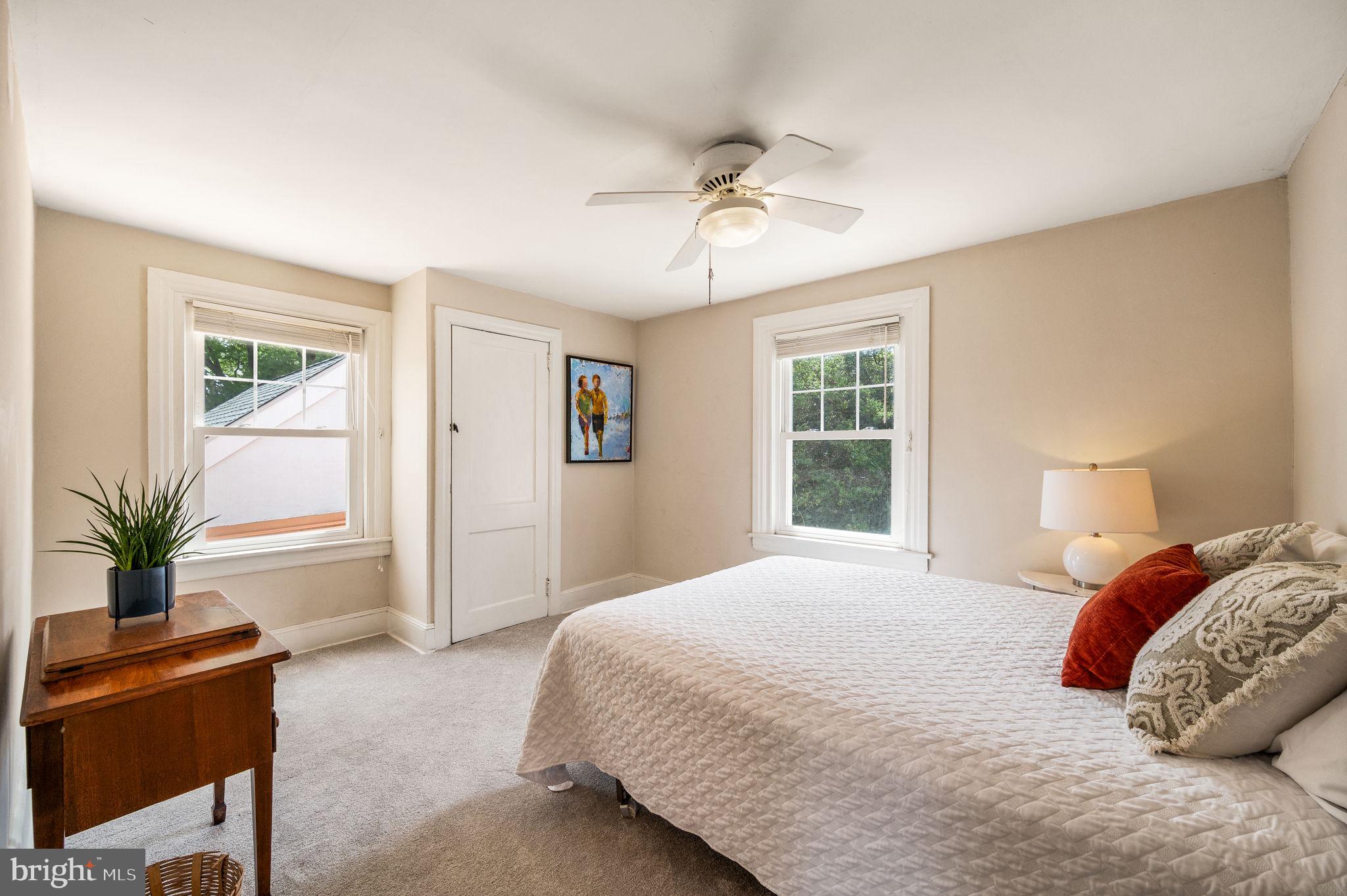 320 Riverview Road Swarthmore, PA 19081 - Photo 22 of 38 a bedroom with a large bed and a window