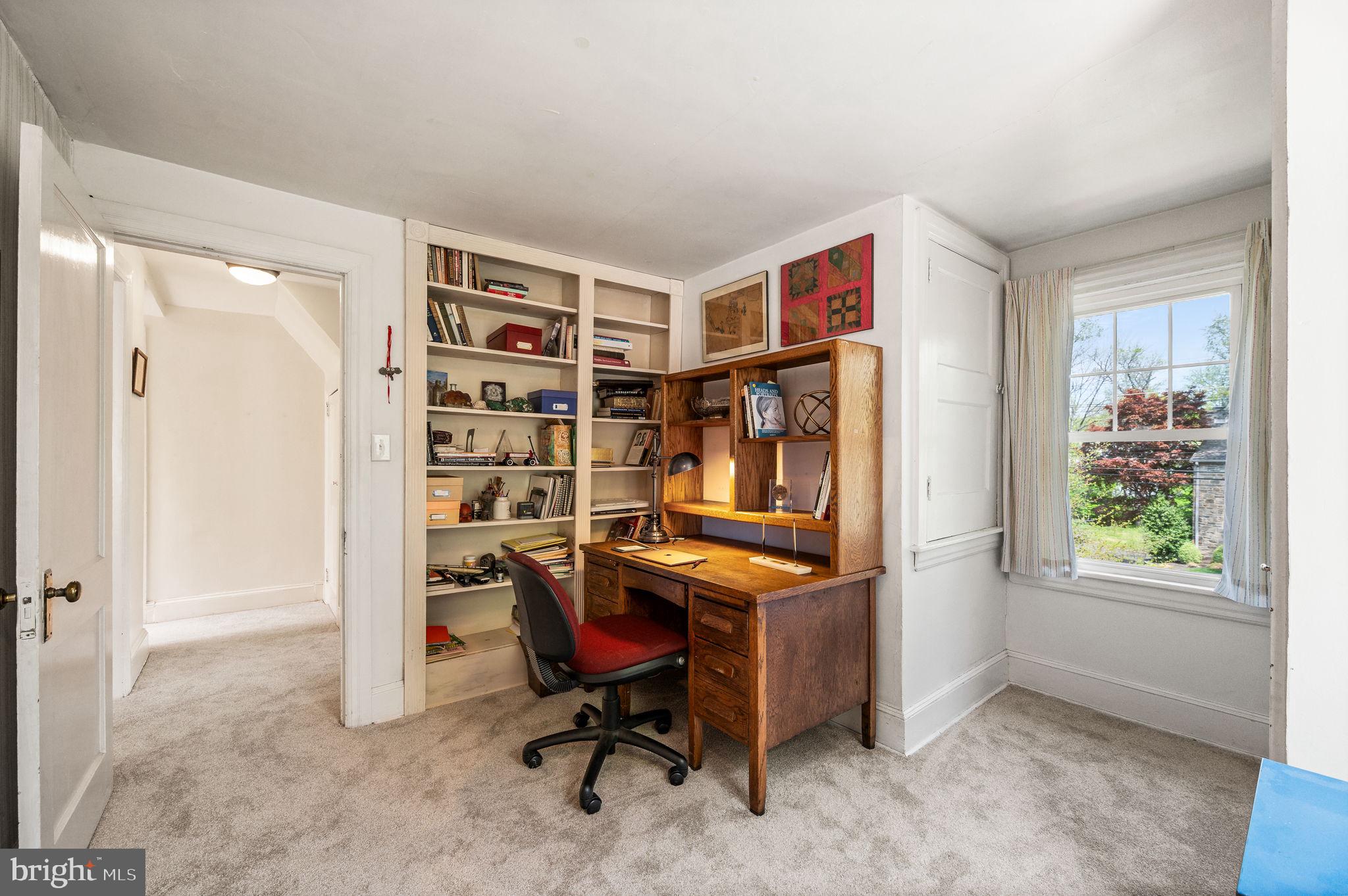 320 Riverview Road Swarthmore, PA 19081 - Photo 26 of 38 a view of a workspace with furniture and a window