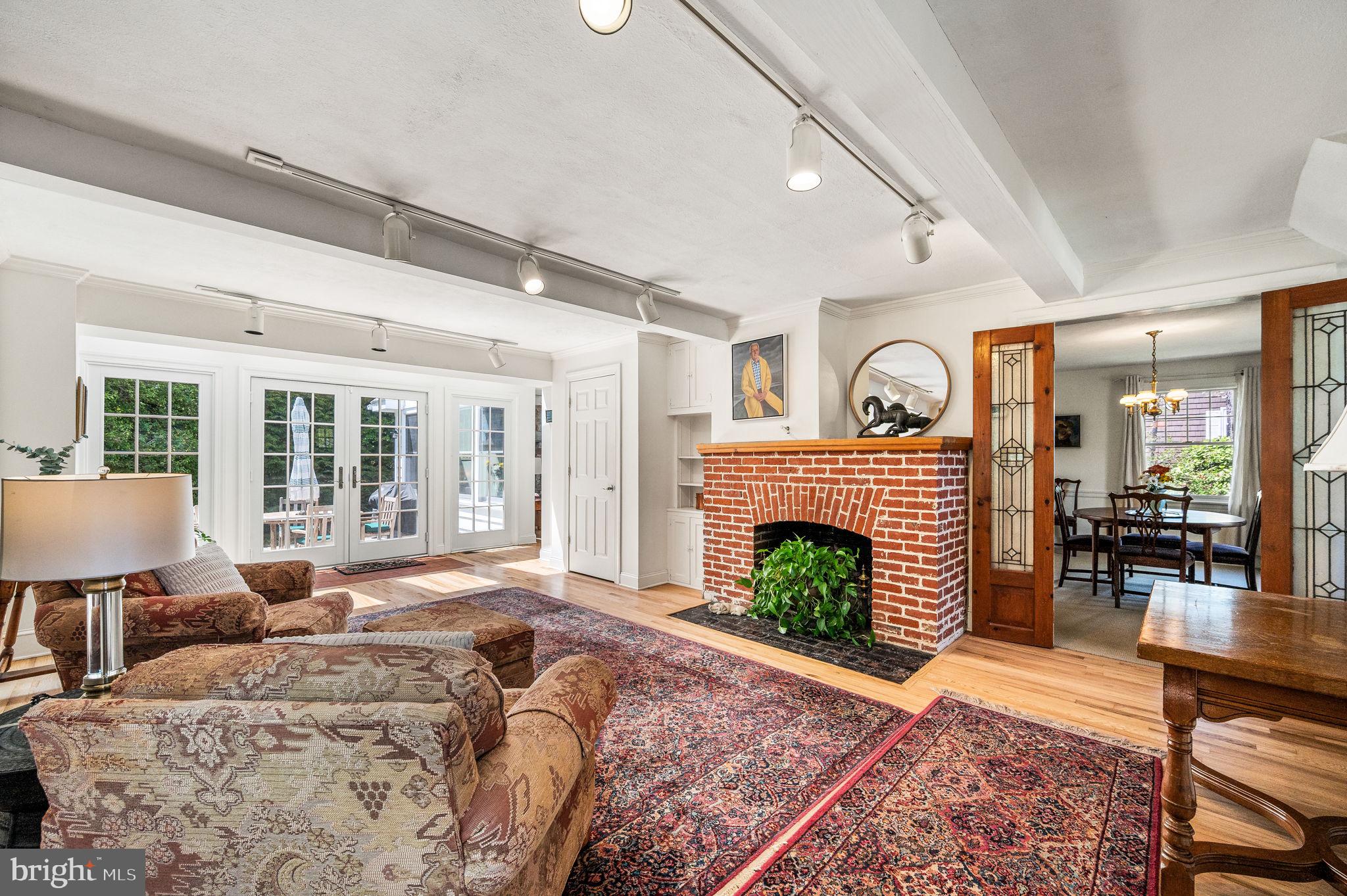 320 Riverview Road Swarthmore, PA 19081 - Photo 5 of 38 a bedroom with furniture fireplace and window