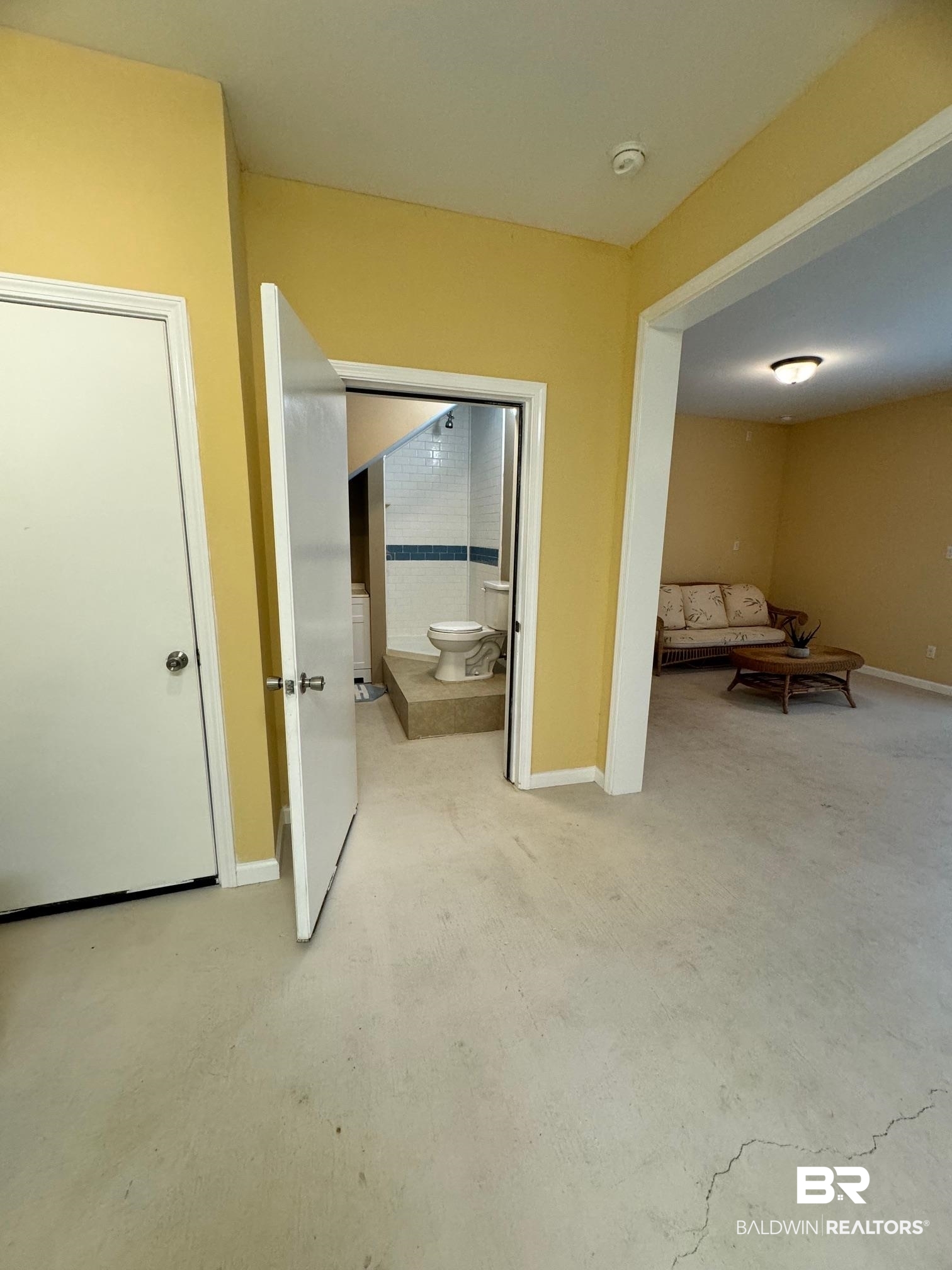 1985 Ridgewood Drive South Lillian, AL 36549 - Photo 14 of 40 Corridor with concrete flooring