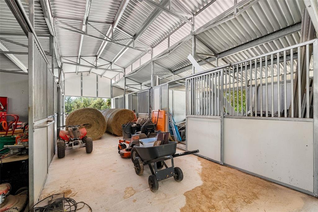 25723 Bareva Road Weeki Wachee, FL 34614 - Photo 13 of 55 a view of gym equipment with windows