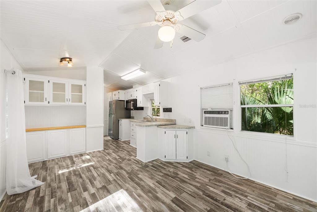 25723 Bareva Road Weeki Wachee, FL 34614 - Photo 30 of 55 a kitchen with a sink cabinets and window