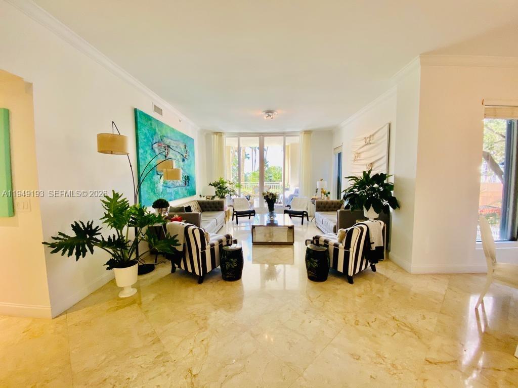 Key Biscayne Key Biscayne, FL 33149 - Photo 3 of 28 a living room with furniture potted plant and a window