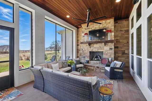 a view of a backyard with sitting area