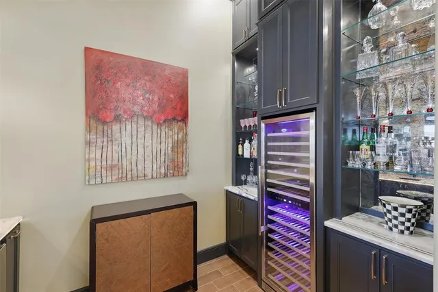 a room that has a bed and a table in it