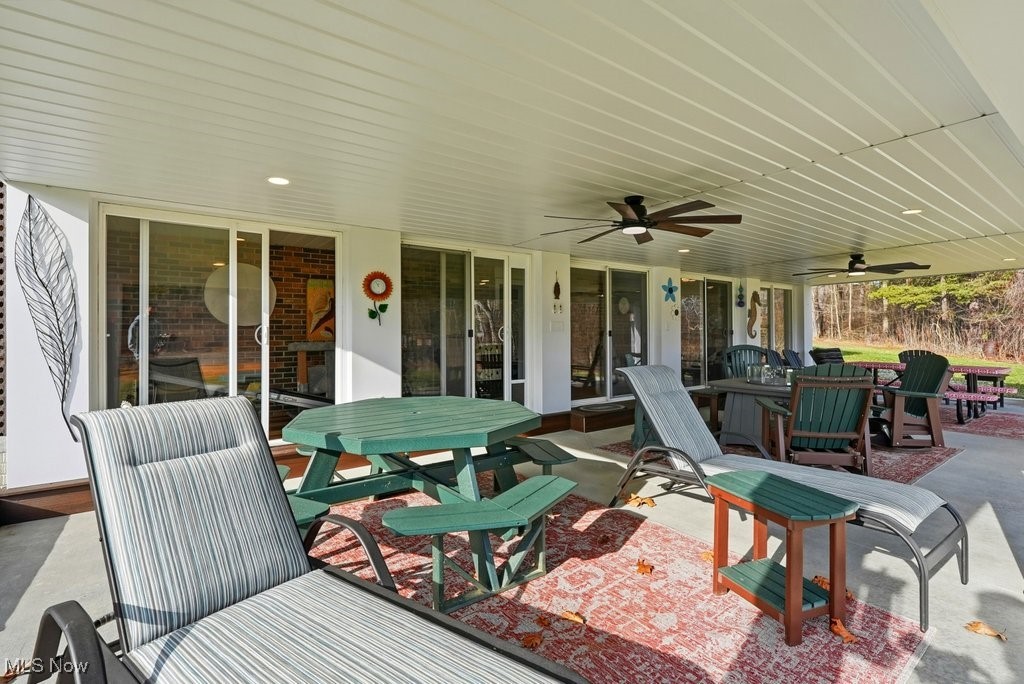 1430 Magnolia Road Southwest Dellroy, OH 44620 - Photo 39 of 50 Seamless indoor-outdoor flow with direct access from the home to this spacious covered patio.