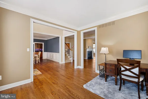 a view of a livingroom with furniture and wooden floor