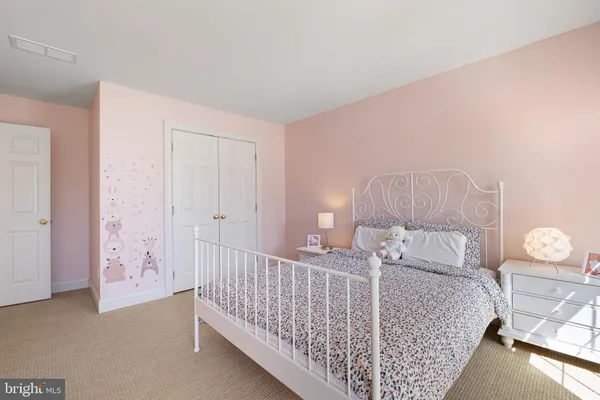 a bed room with a bed and a window