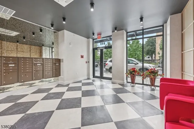 a kitchen with a stove a sink and a microwave