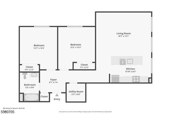 a kitchen that has a microwave a stove and a sink with wooden floor