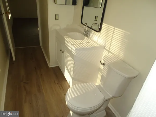 a bathroom with a sink and toilet