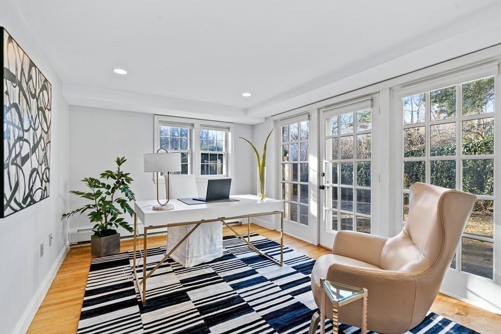 8 Old Farm Road Wellesley, MA 02481 - Photo 19 of 25 a living room with furniture large window and wooden floor