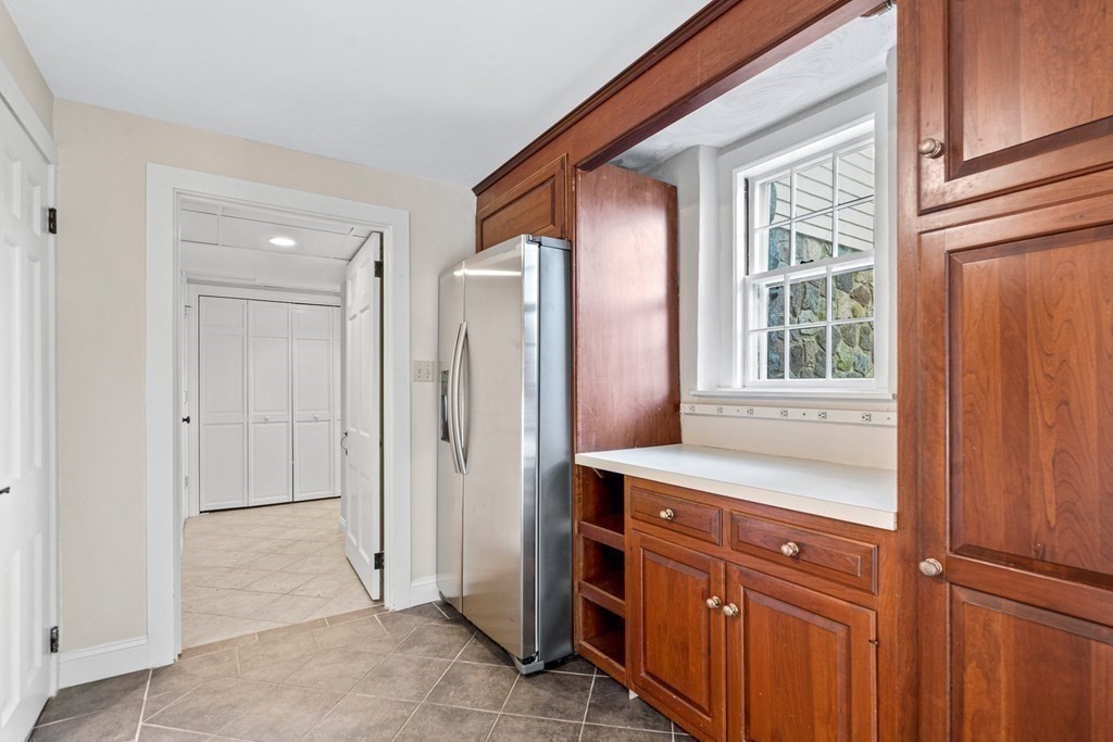 8 Old Farm Road Wellesley, MA 02481 - Photo 23 of 25 a view of a sink and a mirror