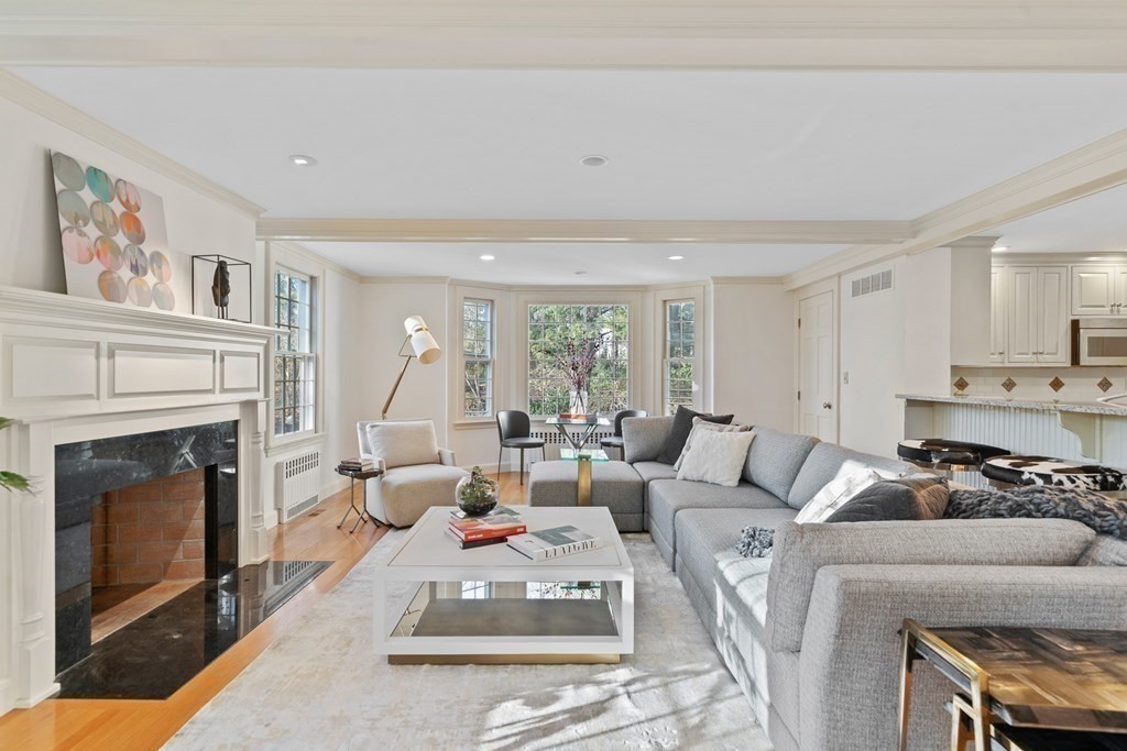 8 Old Farm Road Wellesley, MA 02481 - Photo 8 of 25 a living room with furniture a fireplace and a large window
